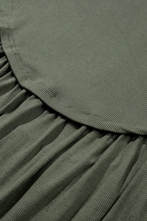Moss ribbed peplum blouse with ruffled detail