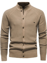 Textured knit stand collar cardigan in caramel with button closure and subtle diamond pattern detail.