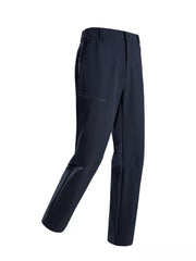 Navy blue men's sweatpants with zippered pockets and elastic waistband.