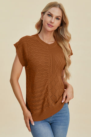 Brown knit patchwork top with V-neck and short sleeves, featuring cable and diamond stitch details.