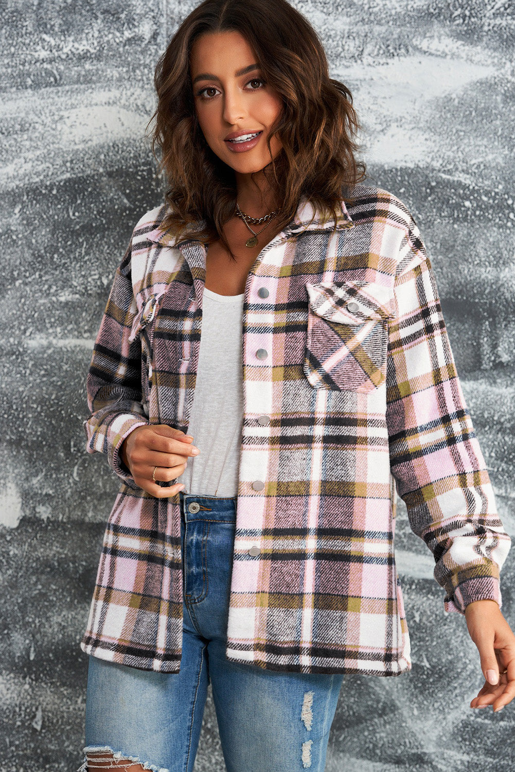 Soft plaid shacket in pink with buttoned patch pockets and collared neckline.