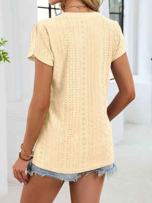 Pastel yellow eyelet tee with petal sleeves and V-neck, casual women's top.
