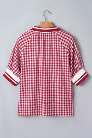 Red gingham cotton blend shirt with puff sleeves and striped collar and cuffs.