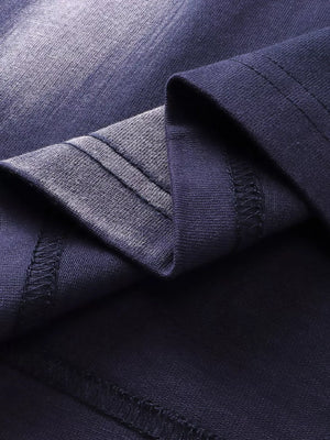 Men's dark navy t-shirt with abstract brushstroke detail and visible stitching.