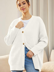 White ribbed knit cardigan with balloon sleeves and button front.