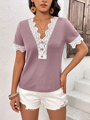 Waffle knit henley shirt in lilac with white lace trim and button detail.