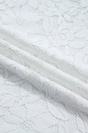 White sheer lace blouse with floral pattern and ruffled neckline detail