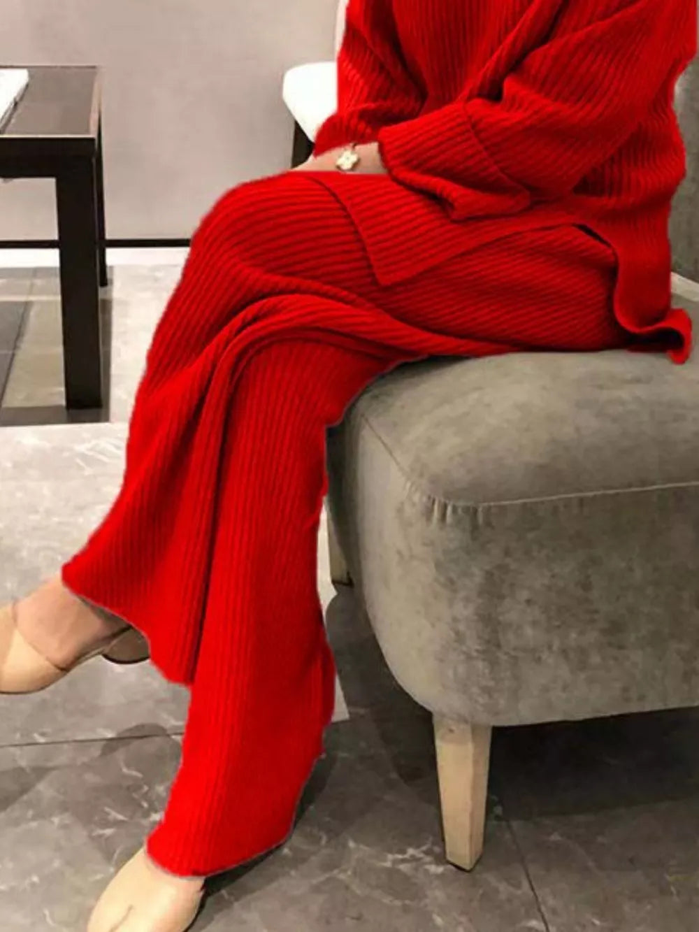 Red ribbed knit sweater set with wide leg pants and crew neck sweater.