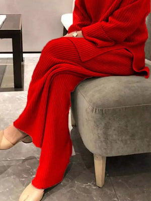 Red ribbed knit sweater set with wide leg pants and crew neck sweater.