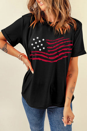 Black t-shirt with distressed American flag graphic and rolled sleeves.
