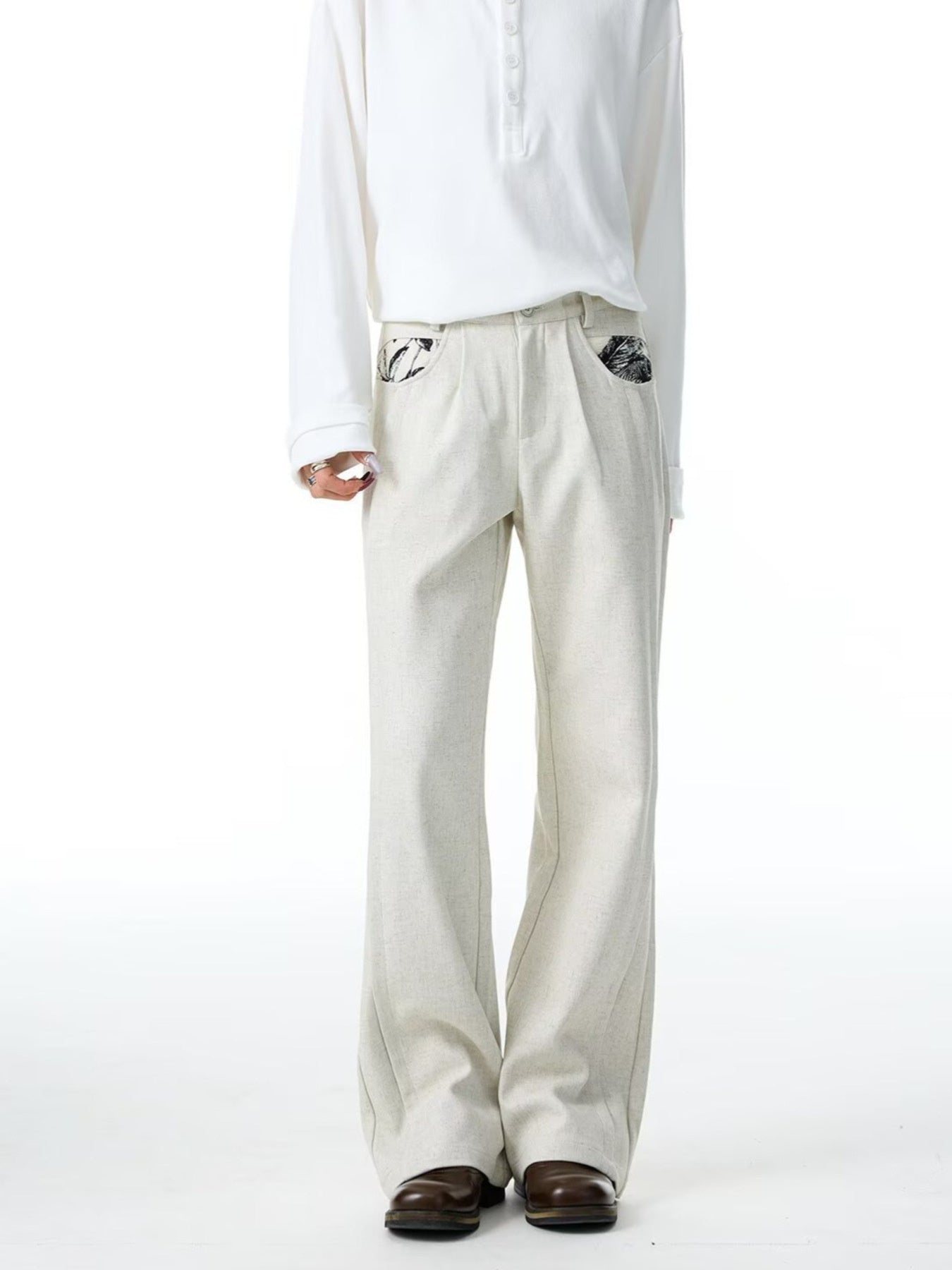Men's ivory wide-leg trousers with patterned pocket details