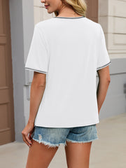 White short sleeve t-shirt with black contrast trim on neckline and sleeves