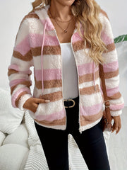 Fuzzy striped zip-up hoodie in blush pink, white, and brown with a hood and pockets.