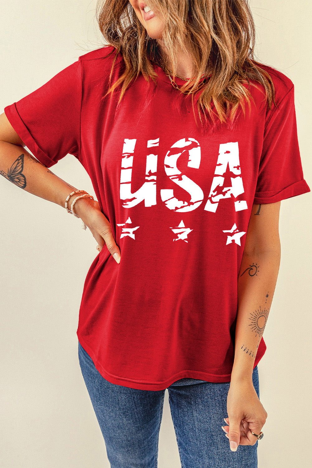 Red USA graphic tee with distressed lettering and stars, short sleeves, cotton blend.