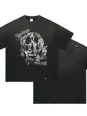Black distressed graphic tee with skull print and ripped details