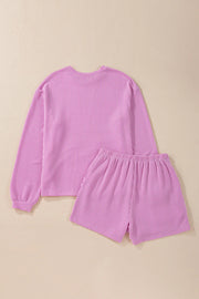 Ribbed knit matching set in Moonlit Mauve with long sleeves and elastic waist shorts.