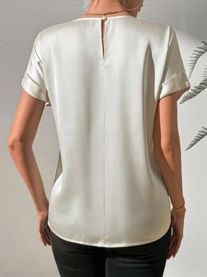 Light gray satin blouse with cuffed short sleeves and back keyhole detail.