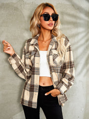 Checkered collared jacket in tan and brown plaid with button front and chest pockets.