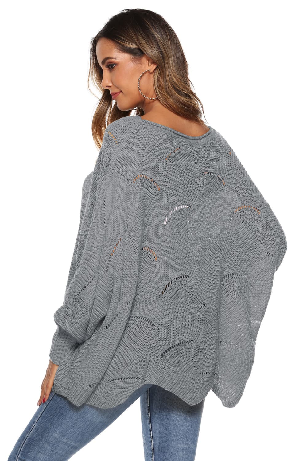 Light gray acrylic knit sweater with openwork detail and cocoon sleeves.