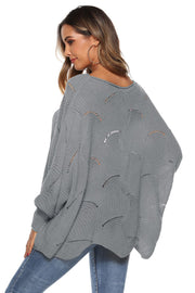 Light gray acrylic knit sweater with openwork detail and cocoon sleeves.