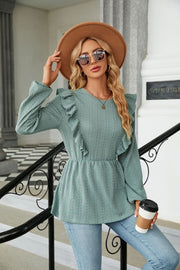 Sage textured ruffle peplum blouse with long sleeves and crew neck.