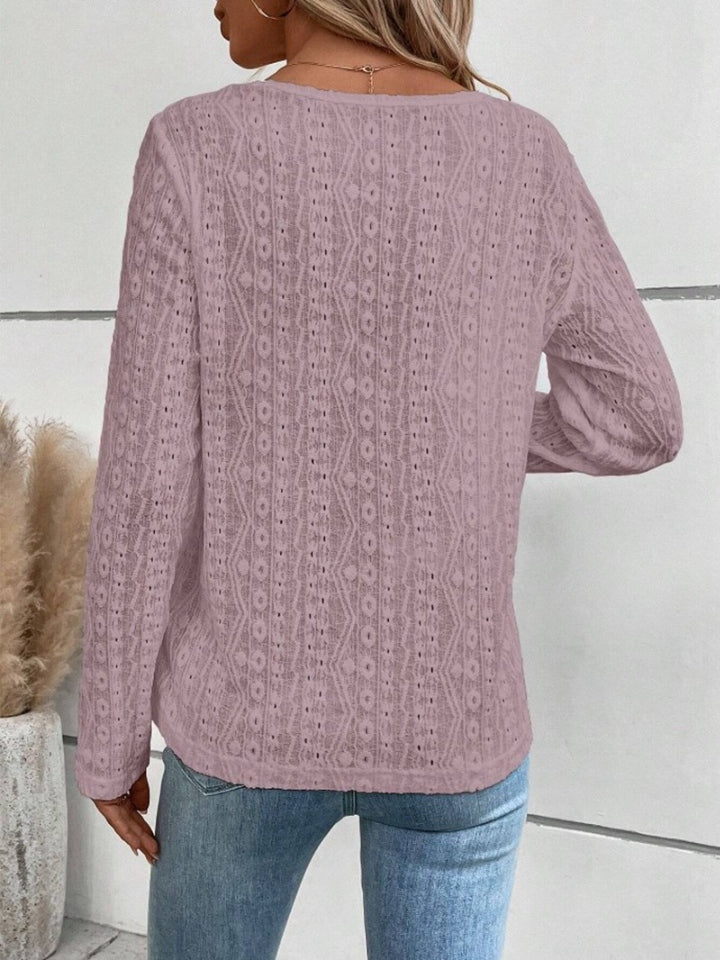 Lilac textured long sleeve henley top with open knit pattern.