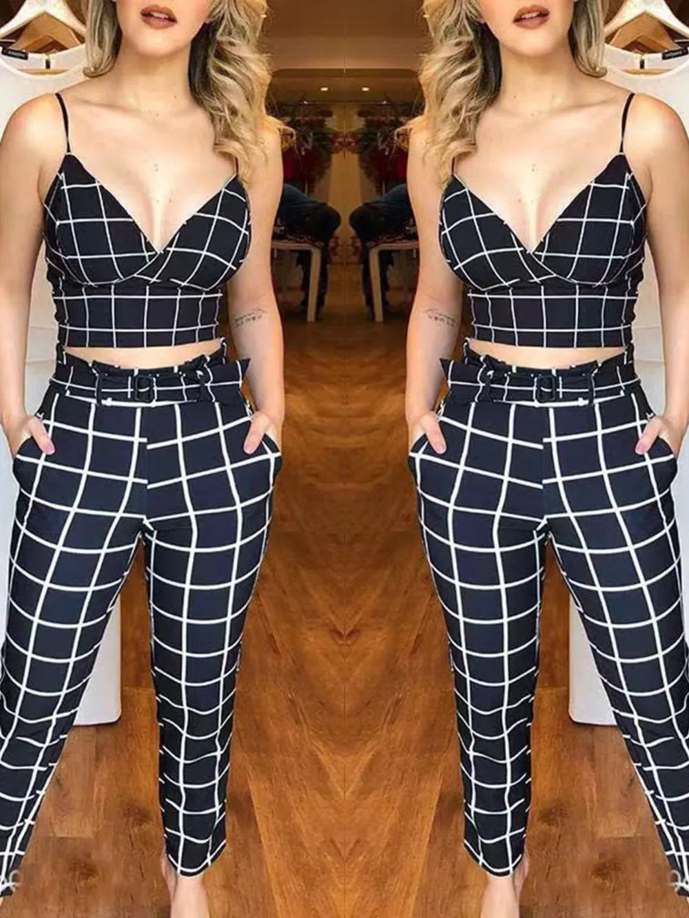 Chic black and white grid print two-piece set with a cropped cami and belted pants.