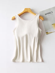 White built-in support tank top with scoop neck and racerback detail.
