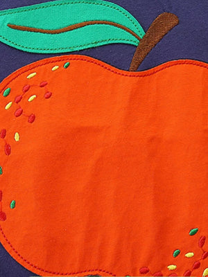Toddler t-shirt with bright orange apple appliqué and green leaf detail.