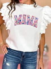 White blouse with ruffled sleeves and colorful leopard print "MAMA" appliqué.