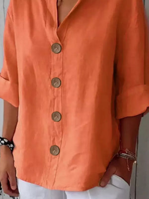 Orange button-down shirt with relaxed fit and wooden buttons.