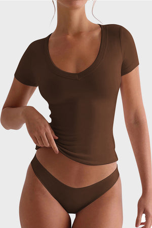 Brown V-neck second-skin tee with short sleeves, shown on a model.