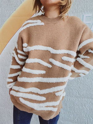 Tan acrylic crewneck sweater with textured white stripe pattern