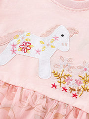 Pink cotton baby dress with embroidered unicorn and floral details, ruffle sleeve, tulle skirt.