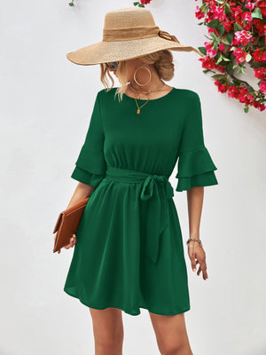 Forest green tiered sleeve mini dress with tie waist and A-line skirt.