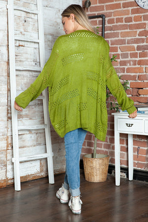 Open-knit slouchy cardigan in matcha green with a relaxed fit and open weave detail.