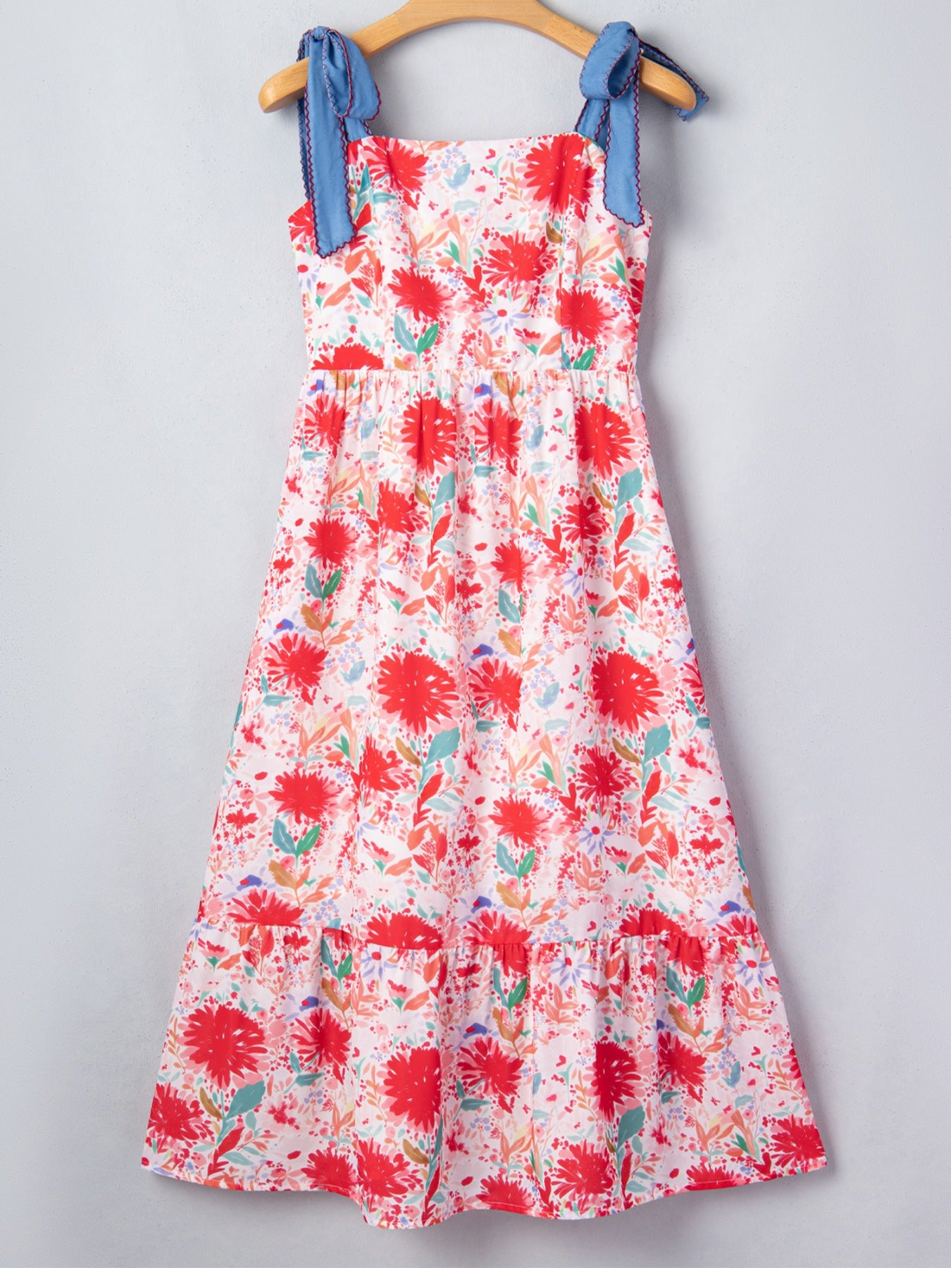 Floral print midi dress with tie shoulders and tiered hem