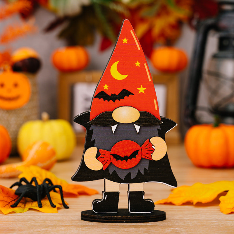 Halloween gnome figurine in Style A with moon, bats, and stars on hat, holding candy.