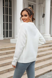 White brushed-knit crewneck pullover sweater with ribbed cuffs and hem