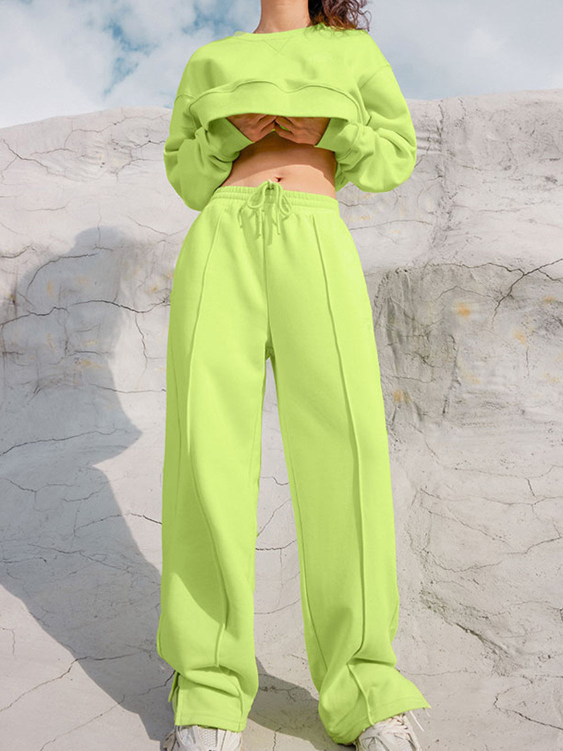 Lime seamed sweatshirt and wide-leg lounge pants with drawstring waist and front seams.