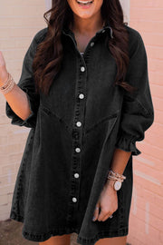 Black denim shirtdress with button front and ruffled cuffs.