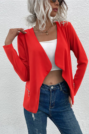 Red drape front jacket with zip details on sleeves and pockets.