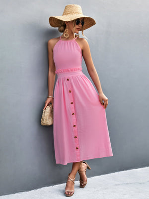Pink button-down midi dress with halter neck and ruffled waist detail.