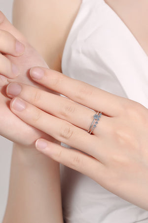 Silver layered ring set with moissanite sparkle details.