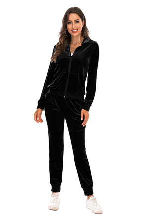 Black velvet loungewear set with zip-up hoodie and jogger pants.