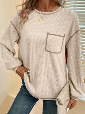 Ribbed knit top in Dust Storm with contrast stitching and a chest pocket.