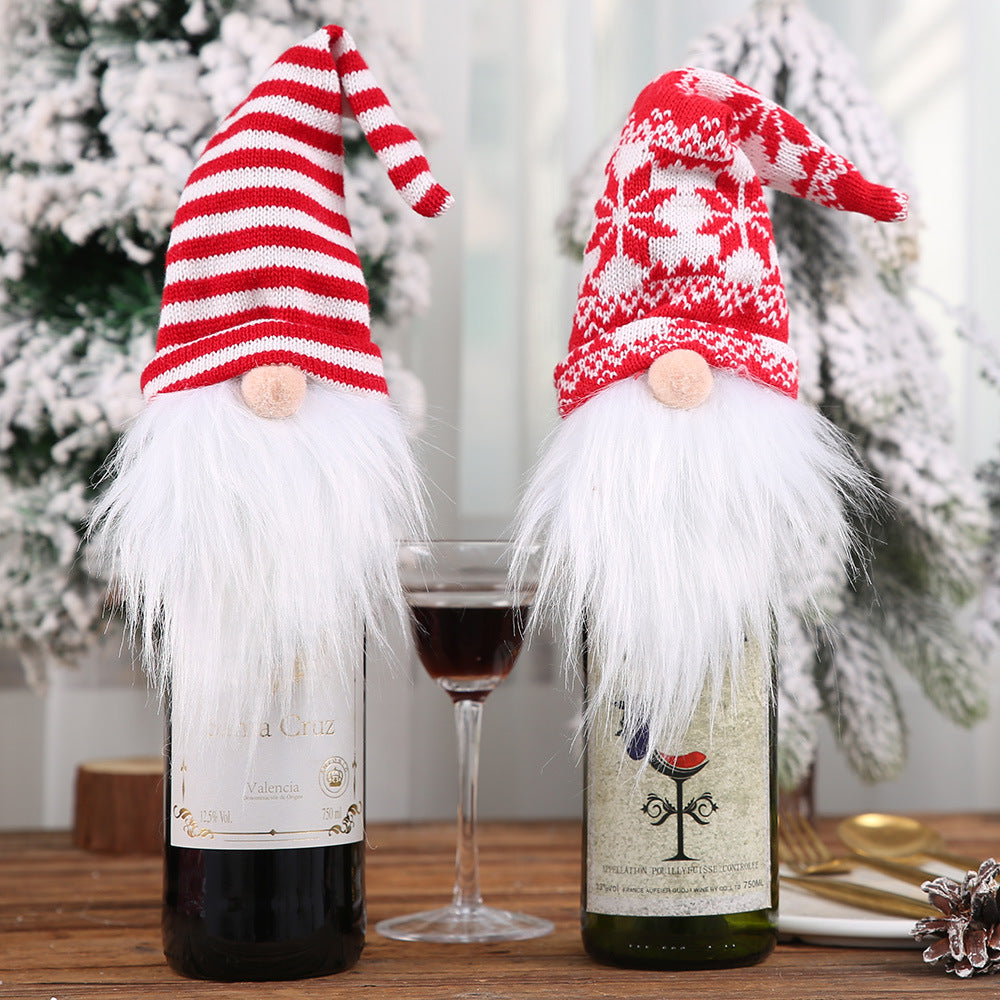 Festive gnome bottle toppers in red and white striped and snowflake patterns with white beards.