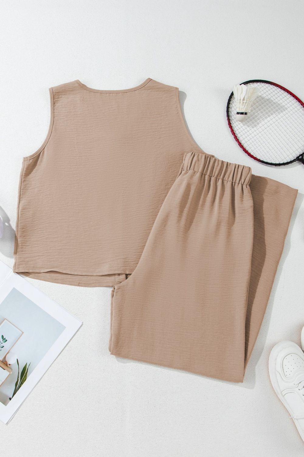 Camel button-front vest and drawstring palazzo pants set with textured fabric.