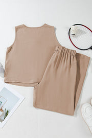 Camel button-front vest and drawstring palazzo pants set with textured fabric.