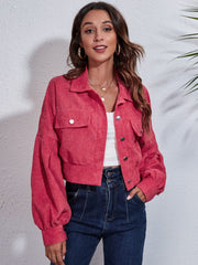 Deep Rose corduroy cropped jacket with balloon sleeves and button front.
